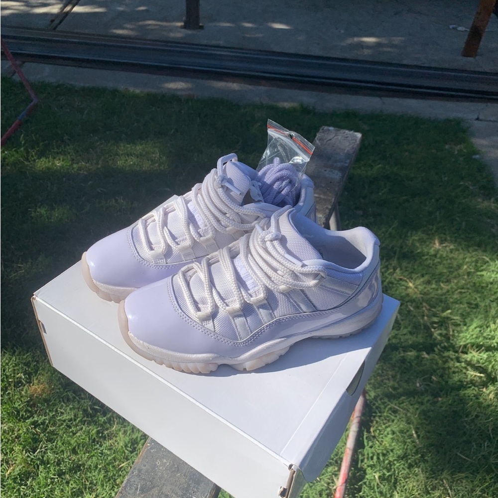 Jordan Retro 11 Low White and Gold Sneakers